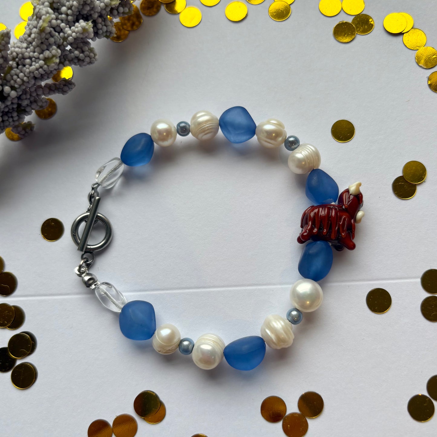 Blue and white freshwater pearl Scottish highland cow bracelet