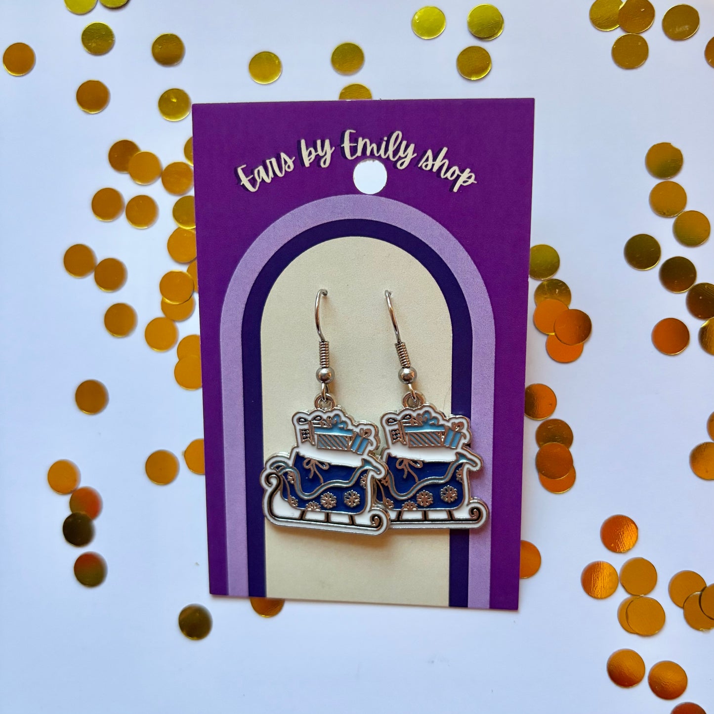 Silver and blue cartoon winter sleigh dangle Christmas earrings