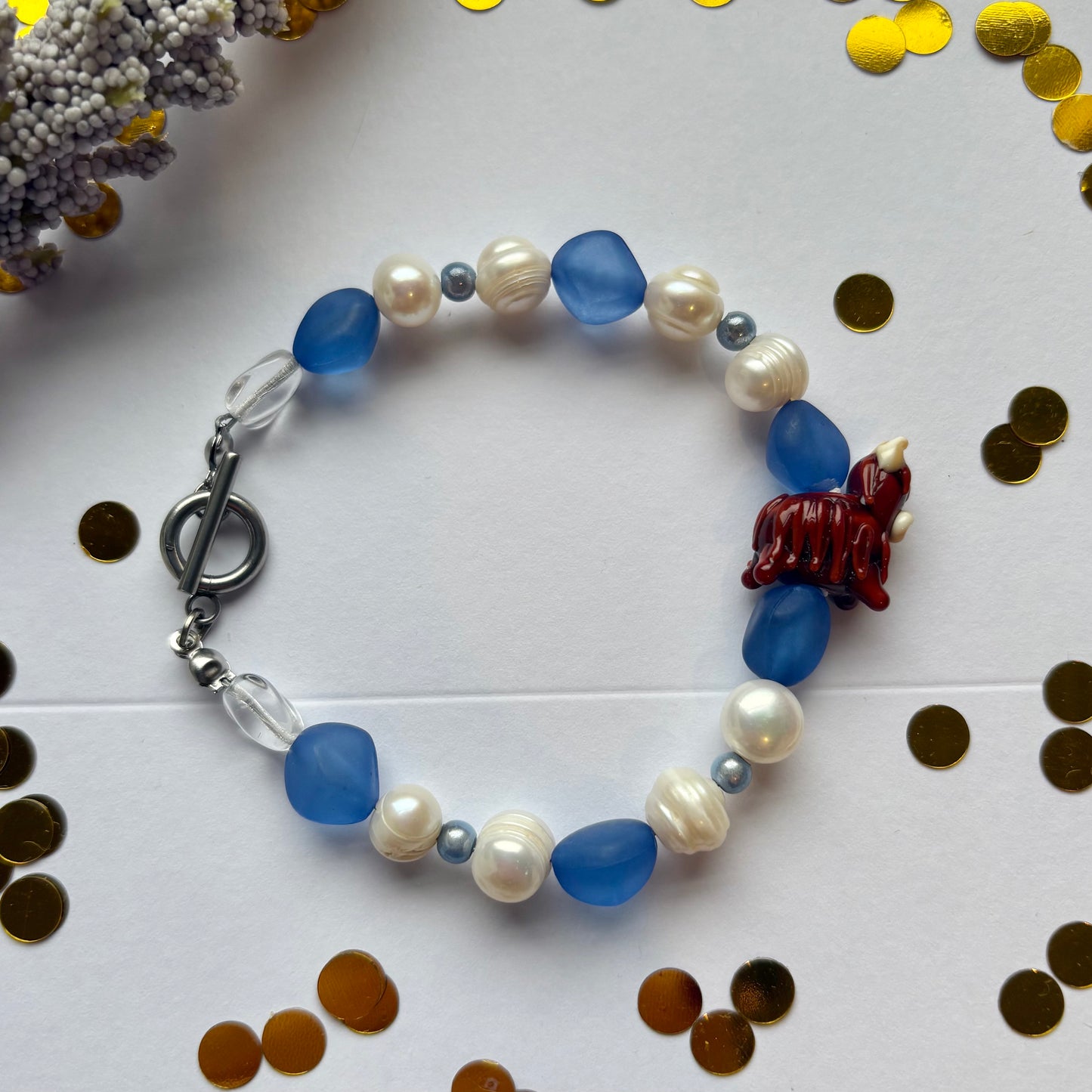 Blue and white freshwater pearl Scottish highland cow bracelet