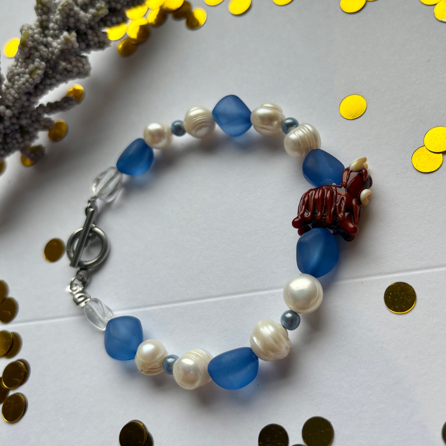 Blue and white freshwater pearl Scottish highland cow bracelet