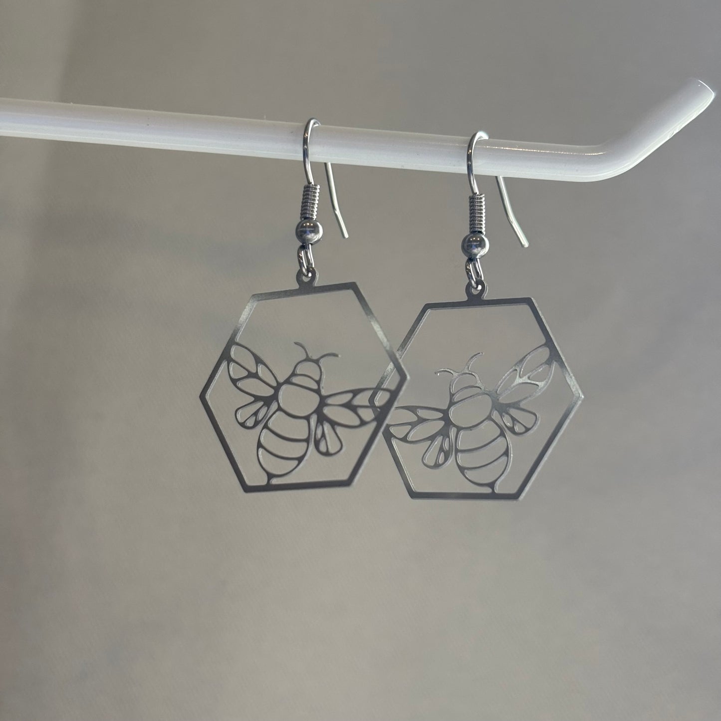Stainless steel silver hexagon bee earrings