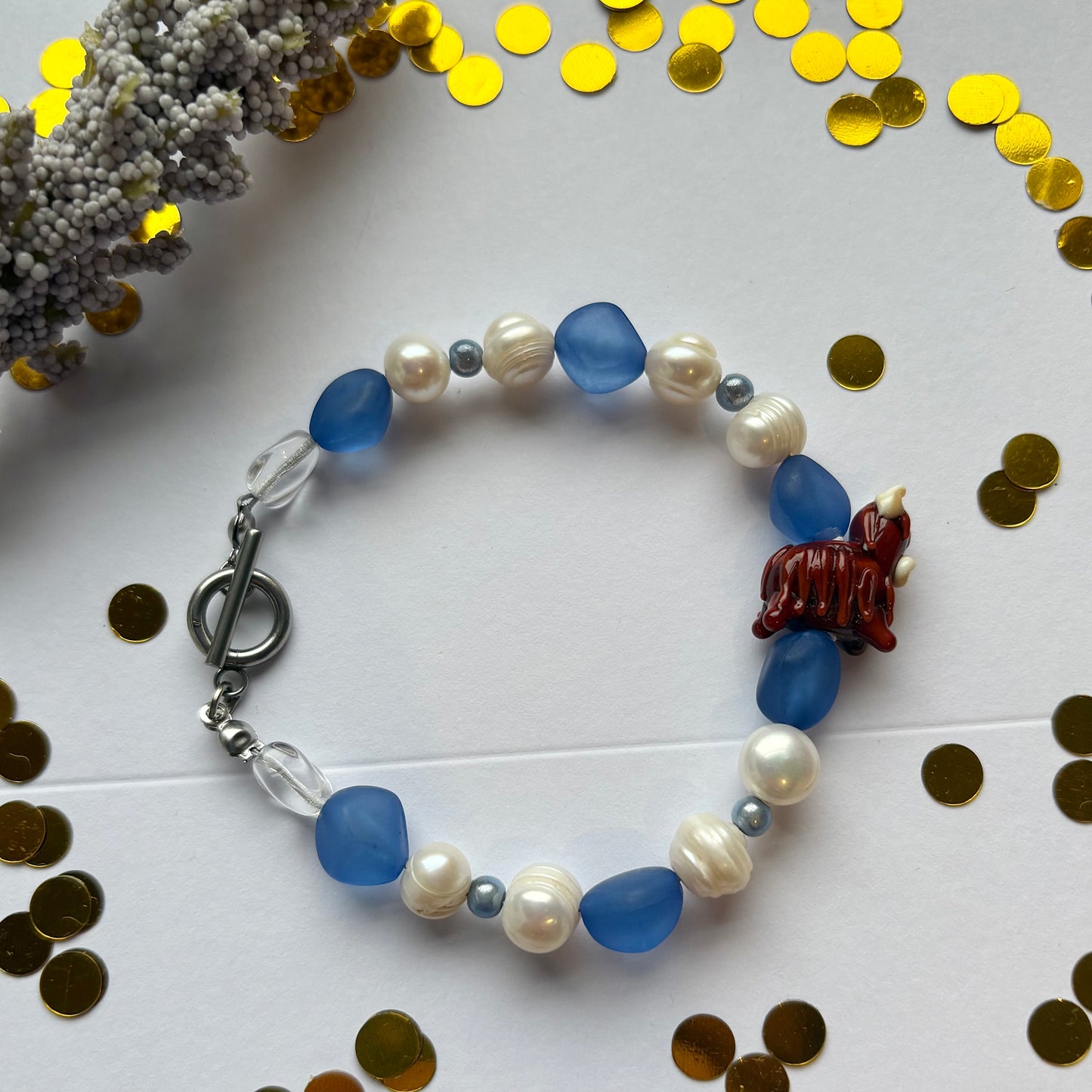 Blue and white freshwater pearl Scottish highland cow bracelet