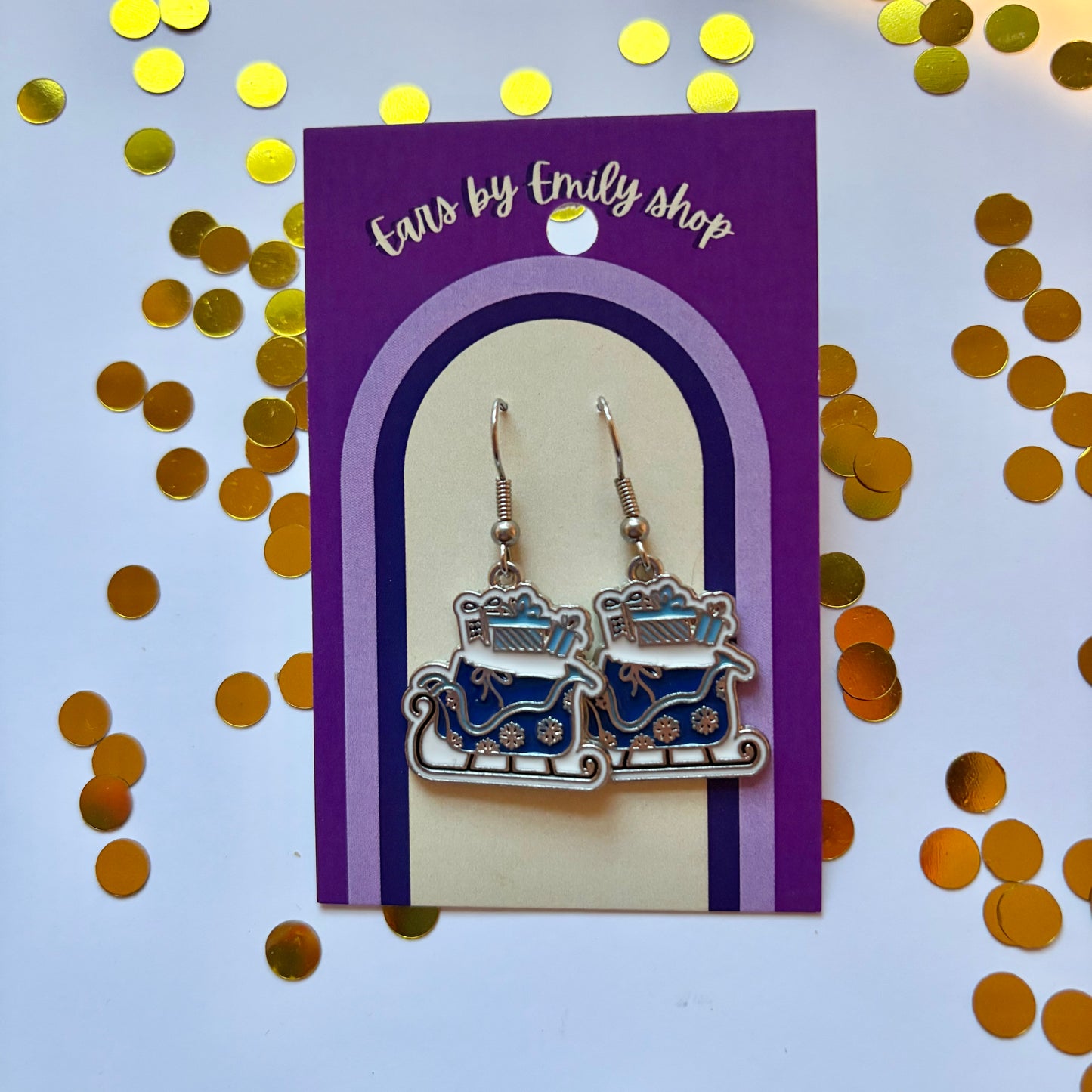 Silver and blue cartoon winter sleigh dangle Christmas earrings