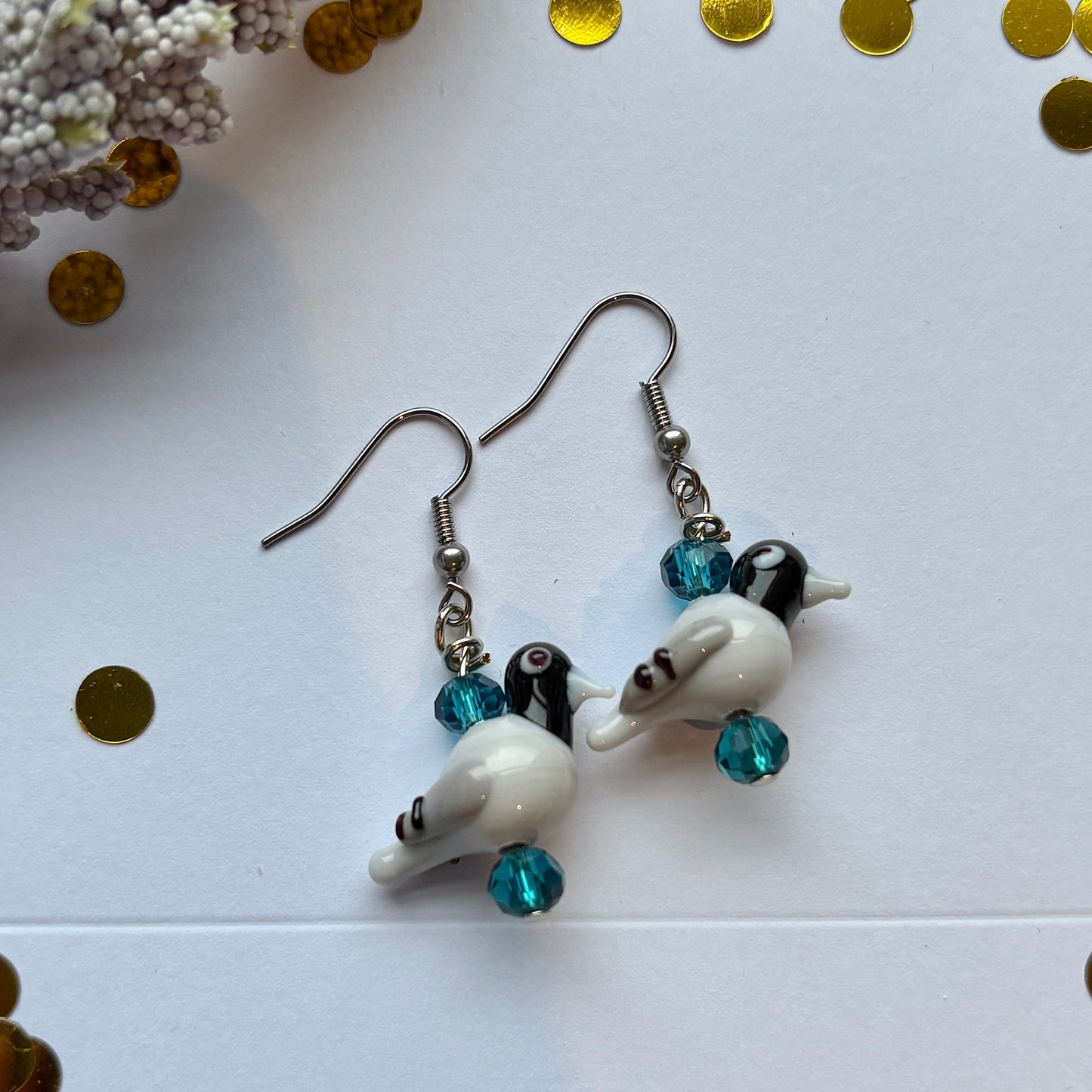 Blue crystal pigeon earrings