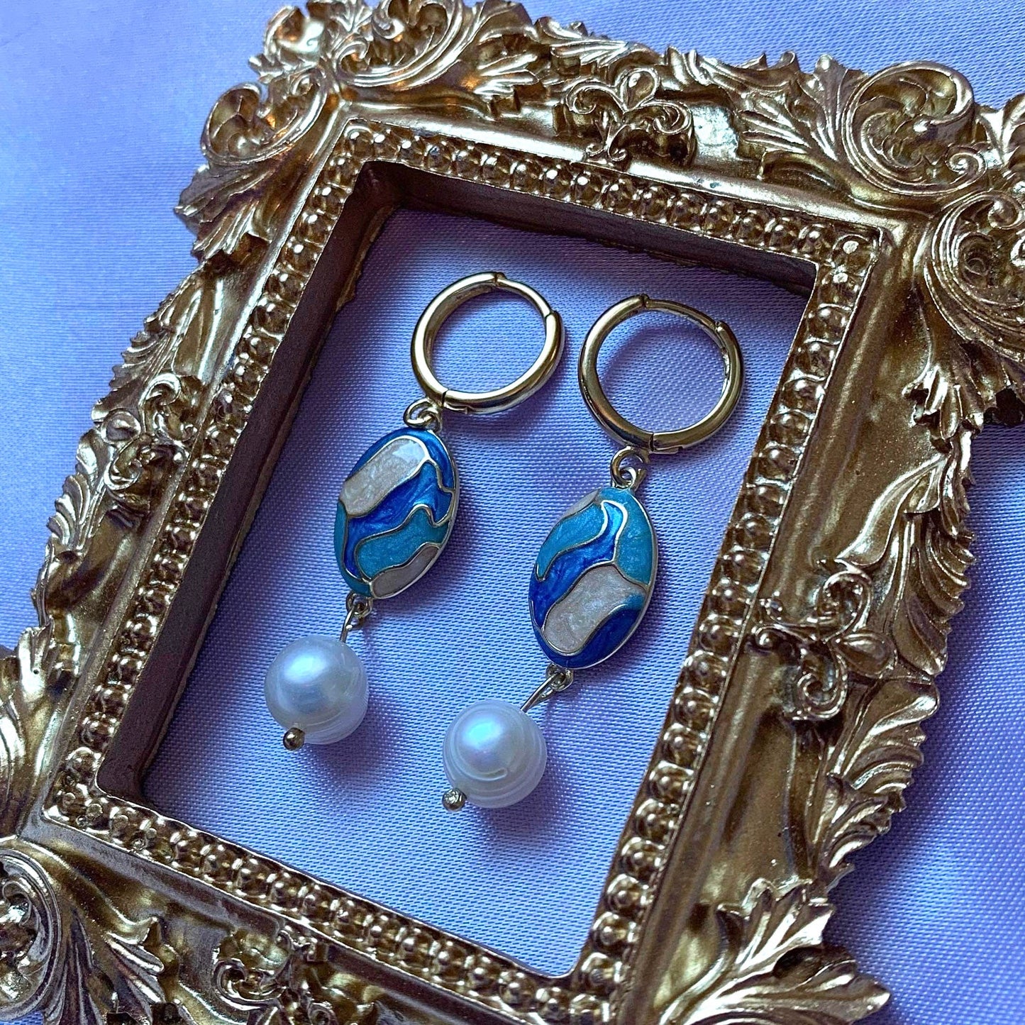 Blue and cream enamel oval and freshwater pearl gold plated hoop earrings